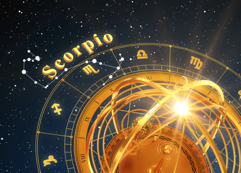 Astrokartografija, prikazana na sliki zemlje v oranžnih odtenkih in astrološkimi znamenji.