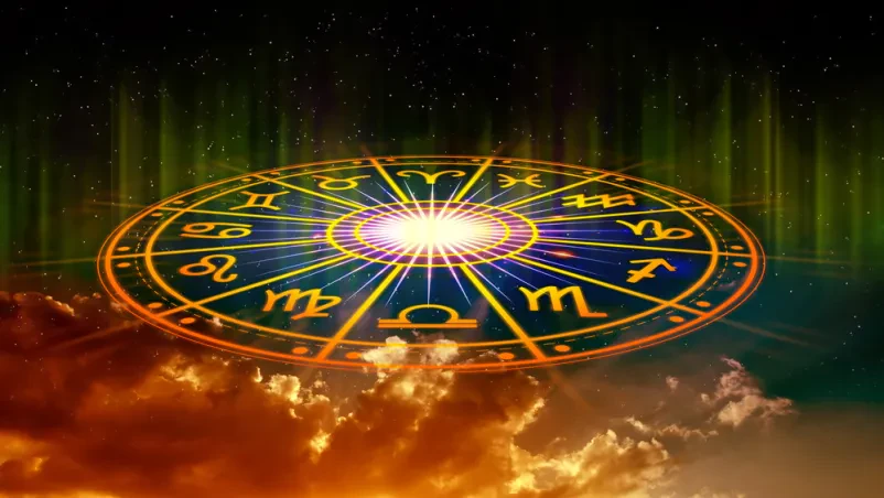 Grafika 12 astroloških znamenj v krogu nad grafičnim prikazom Zemlje, predstavlja astrokartografijo.
