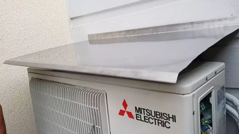 montaža zunanje enote klimatske naprave na objektu v okolici Ljubljane