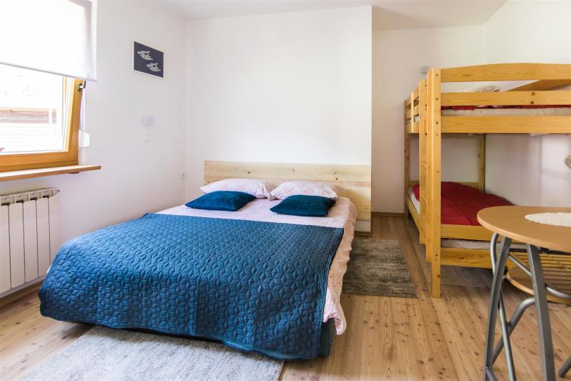 Garsonjera in sobe z letnim vrtom Tolmin