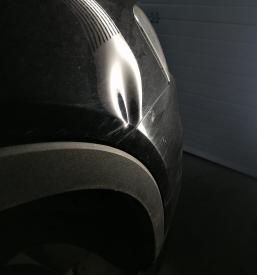 Popravilo udrtin po toči Novo mesto